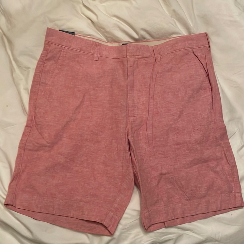 Jcrew factory. Mens salmon/ light red 9 inch inseam, 35 inch waist shorts.